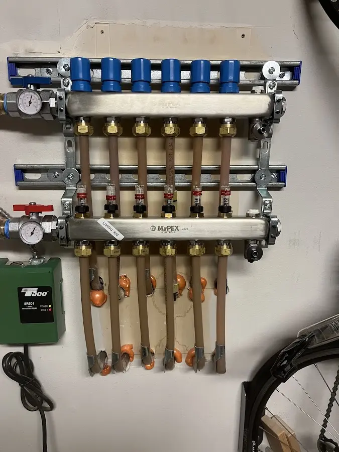 Plumber performing Gas Line Installation at a residential property in Boyne City