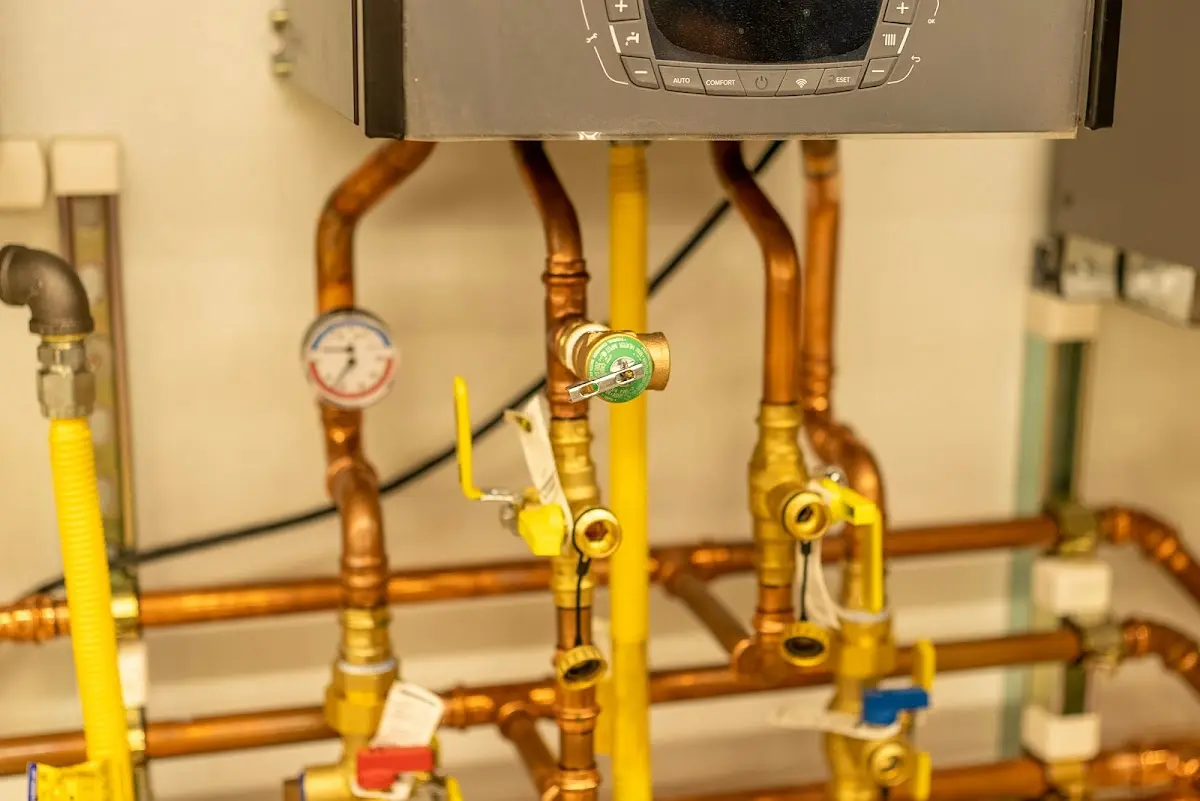 Licensed technician providing Backflow Prevention for a homeowner in Boyne City